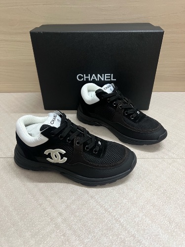 Chanel sneakers made from a mix of mesh, suede, and grained calfskin — 4