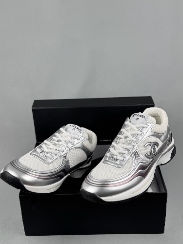 Chanel CC Logo Metallic Trainers in white and silver