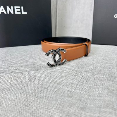 Chanel C100 belt features a distinctive black and gold CC logo buckle — 7