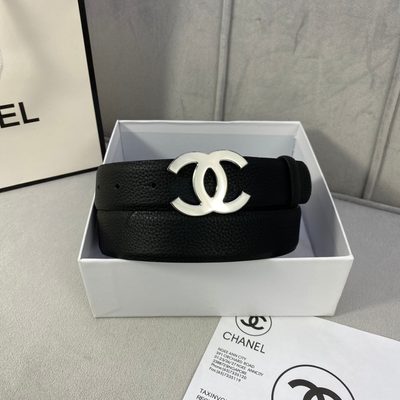 Chanel black leather belt featuring a prominent gold-toned interlocking CC logo buckle — 7
