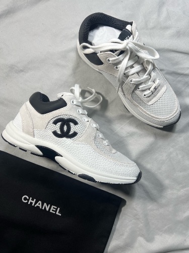 Chanel white and black low-top trainers