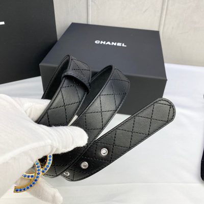 Chanel quilted black leather belt featuring a silver CC logo buckle — 9