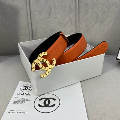 Chanel orange leather belt featuring a circular interlocking CC buckle — 5