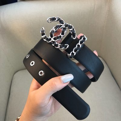 Chanel belt features a black leather strap and a silver chain interlocking CC logo buckle — 5