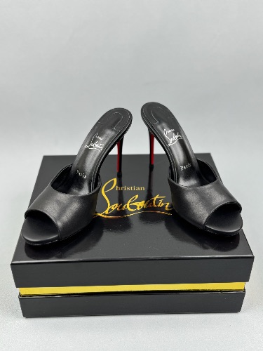 Christian Louboutin leather mules featuring a peep toe and signature red soles — 4