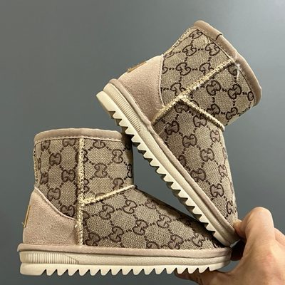 Gucci GG Monogram mini boots — 9