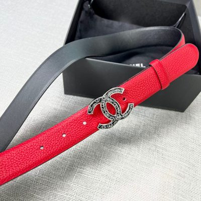 Chanel leather belt features a vibrant red calfskin strap and a distinctive silver CC logo buckle — 3