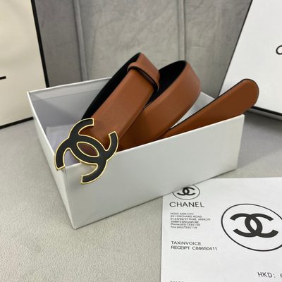 Chanel belt features a distinctive black and silver CC logo buckle — 7