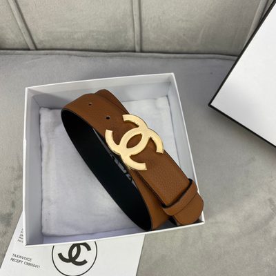 Chanel CC reversible belt features a tan and black calfskin strap with a silver-tone buckle — 9