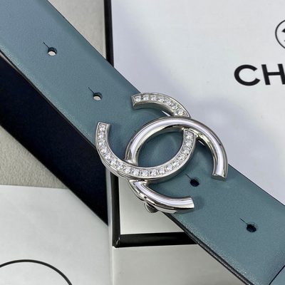 Chanel belt is crafted from light blue leather and features a prominent gold-tone CC logo buckle — 6