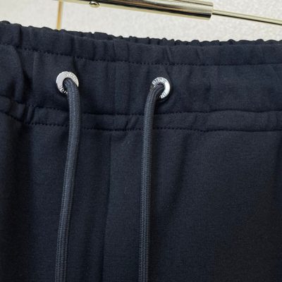 Dior black zip-up track jacket and matching track pants set — 11