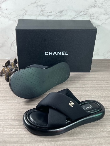Chanel criss-cross puffy fabric slides