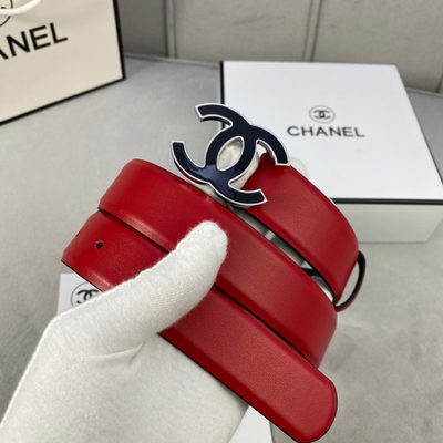 Chanel belt featuring a prominent black and silver interlocking CC logo buckle — 3