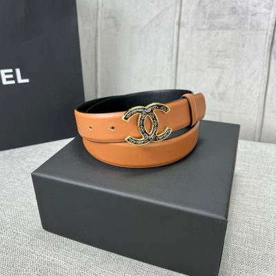 Chanel C100 belt features a distinctive black and gold CC logo buckle — 5