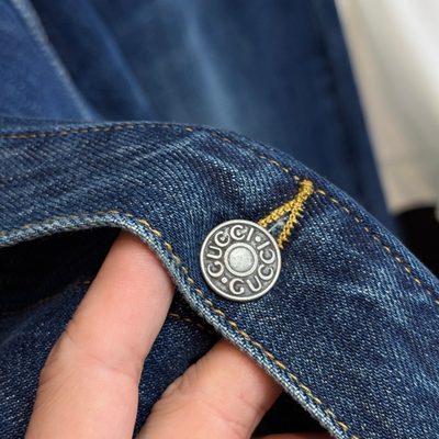 Gucci blue denim trucker jacket and matching relaxed-fit blue jeans — 6