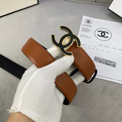 Chanel belt features a distinctive black and silver CC logo buckle — 6