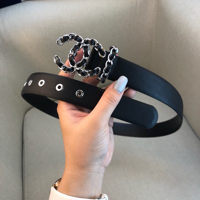 Chanel belt features a black leather strap and a silver chain interlocking CC logo buckle — 3