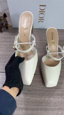 Dior mules featuring a square toe and a gold metallic block heel — 5