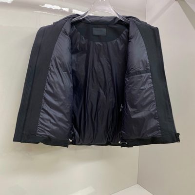Prada-branded puffer gilet — 11