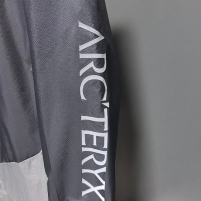 Arc'teryx Norvan Windshell Hoody in a gray and silver — 4