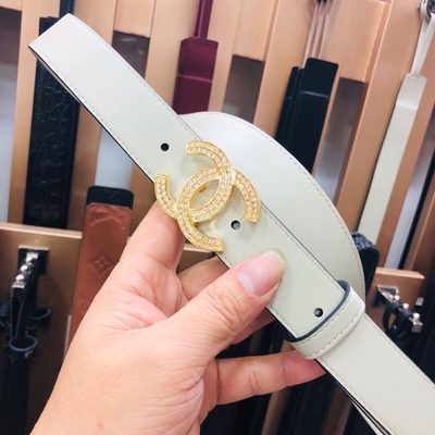 Chanel belt features a distinctive double-C buckle — 6