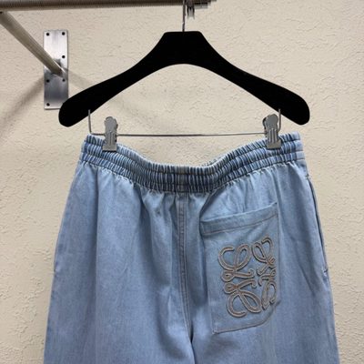 Loewe Paula's Ibiza Wide-Leg Drawstring Jeans in washed blue denim — 4