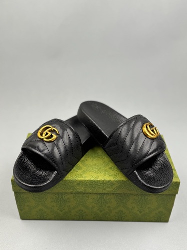 Gucci Black Leather GG Marmont Slides featuring a gold-toned Double G logo — 4