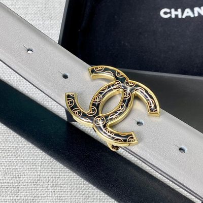 Chanel grey leather belt featuring a distinctive patterned silver-tone CC logo buckle — 9