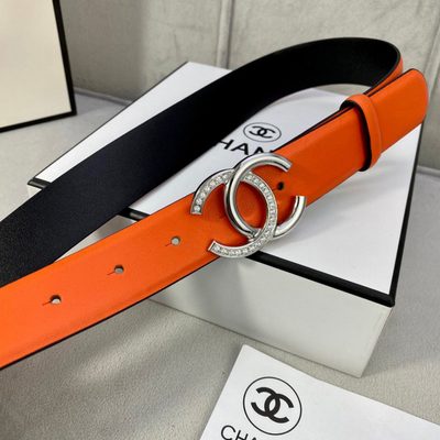 Chanel women's belt features a vibrant orange leather strap paired with a silver-tone, rhinestone-em — 4