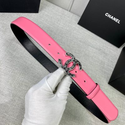 Chanel leather belt features a vibrant pink strap paired with a gold-tone CC buckle — 6