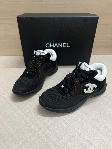 Chanel sneakers made from a mix of mesh, suede, and grained calfskin — 3