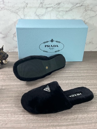 Prada black sheepskin shearling mules