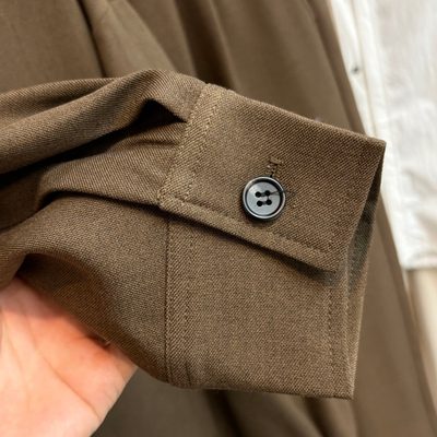 Arcteryx brown matching set featuring a zip-up jacket and wide-leg trousers — 7