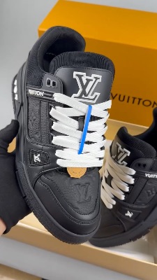 Louis Vuitton trainers in black monogram-embossed grained calf leather — 5
