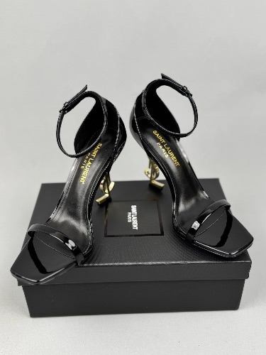 Saint Laurent Opyum sandals in black patent leather with gold-tone monogram heels — 4