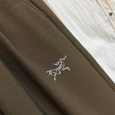 Arcteryx brown matching set featuring a zip-up jacket and wide-leg trousers — 10
