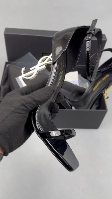 Saint Laurent Opyum sandals in black patent leather with gold-tone monogram heels — 5