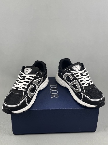Dior B30 sneakers in black, featuring reflective technical fabric and a graphic CD30 signature — 4