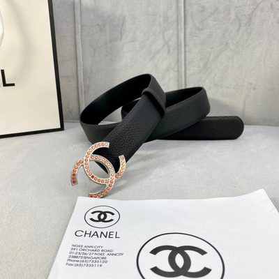 Chanel belt features a black grained leather strap and a gold-tone CC buckle embellished with orange — 6