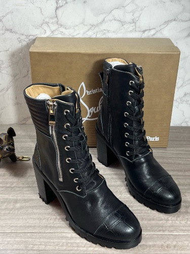 Christian Louboutin black leather En Hiver lug sole combat boots — 4