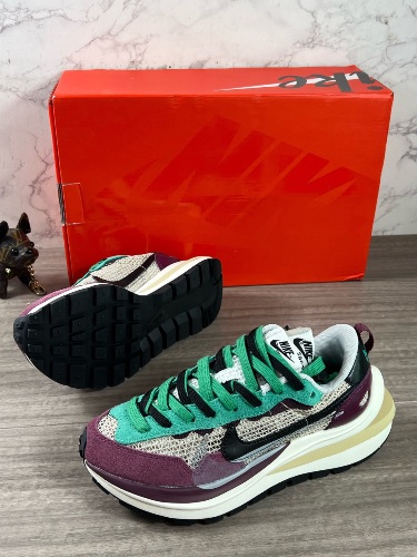 Nike x sacai VaporWaffle "Villain Red/Neptune Green" sneakers