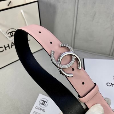Chanel belt featuring a pink leather strap and a gold-toned CC buckle — 6