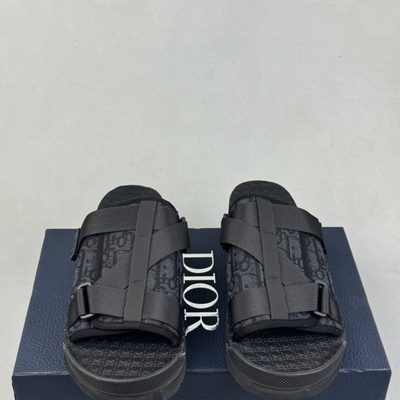 Dior Alpha slides in a "triple black" colorway — 3