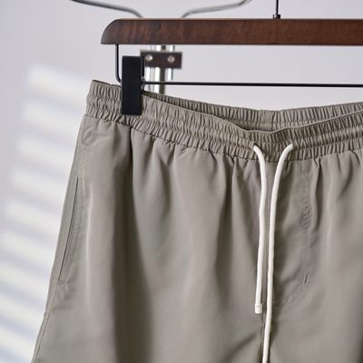 Brunello Cucinelli sage green swim shorts — 5