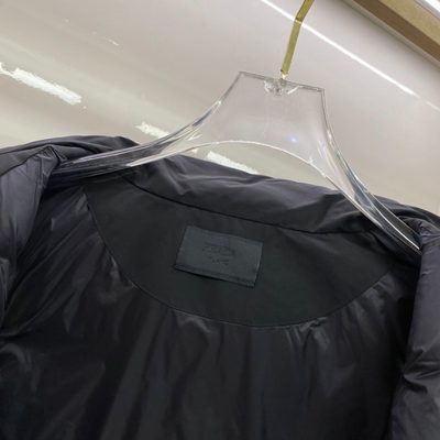 Prada-branded puffer gilet — 9