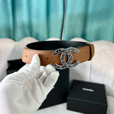 Chanel belt features a silver CC buckle — 4