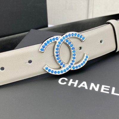 Chanel belt features a distinctive light gray leather strap and a CC logo buckle — 4