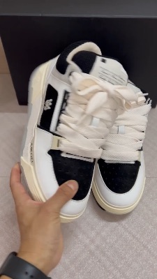 Amiri MA-1 sneakers in a white and black — 4