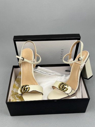 Gucci Marmont White Leather Sandals with a block heel and iconic GG logo hardware