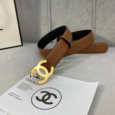 Chanel CC reversible belt features a tan and black calfskin strap with a silver-tone buckle — 7